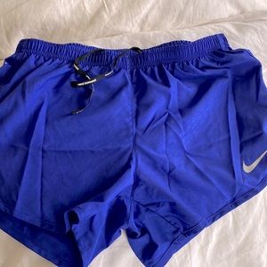 Nike size small dry fit running shorts / purple